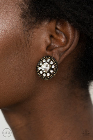 Dazzling Definition - Brass clip on earrings Paparazzi