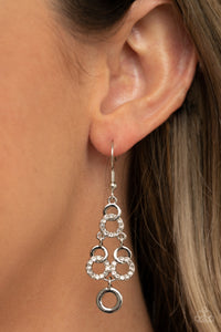 Luminously Linked - White rhinestone earrings Paparazzi